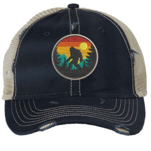 Distressed Bigfoot trucker hat with embroidered Sasquatch patch and mesh back panel for outdoor adventures