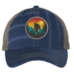 Distressed Bigfoot trucker hat with embroidered Sasquatch patch and mesh back panel for outdoor adventures
